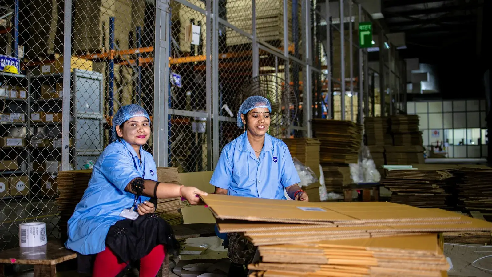 Logistics professionals coordinating cargo in a freight facility